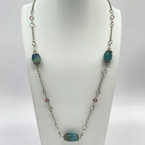 Silvertone necklace with aquamarine colored glass stations
